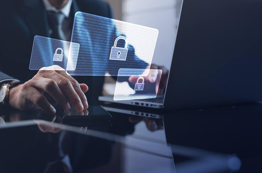 shutterstock_1788958916 someone typing Bridewell security