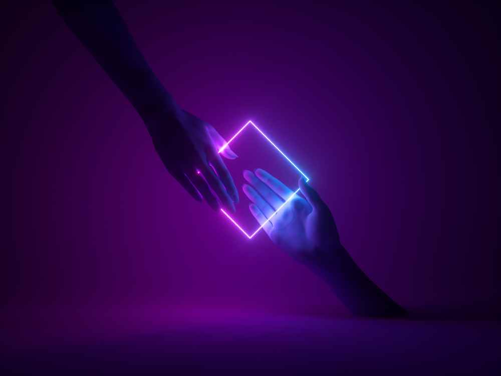 Purple teaming hands reaching