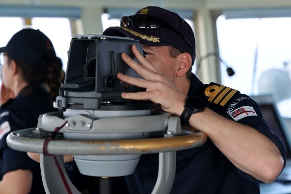 Armed Forces - Man looking through binoculars