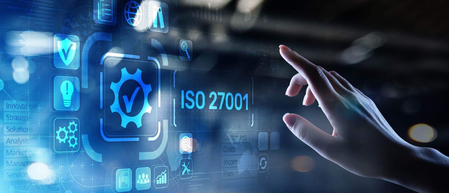 Hand pointing to ISO 27001 text
